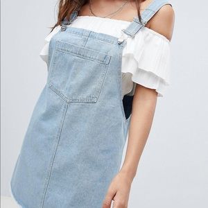 Denim overall dress.
